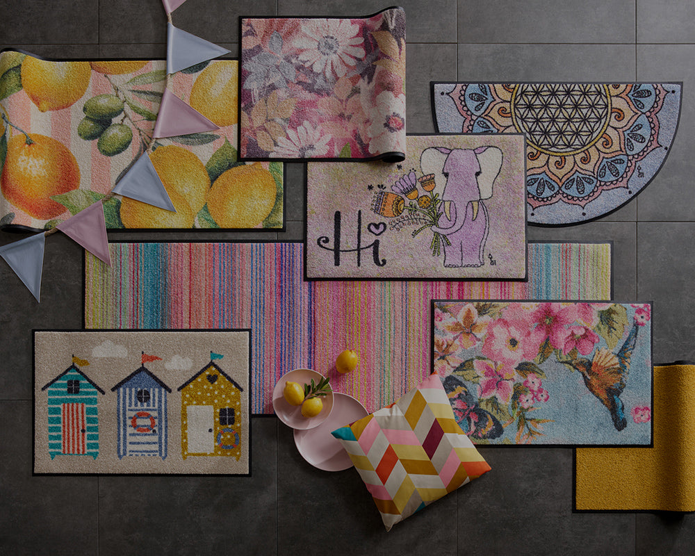 Verschiedene bunte Fußmatten von wash+dry