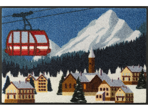 mehrfarbige Fußmatte mit roter Berg-Gondel in einem winterlichen Tal