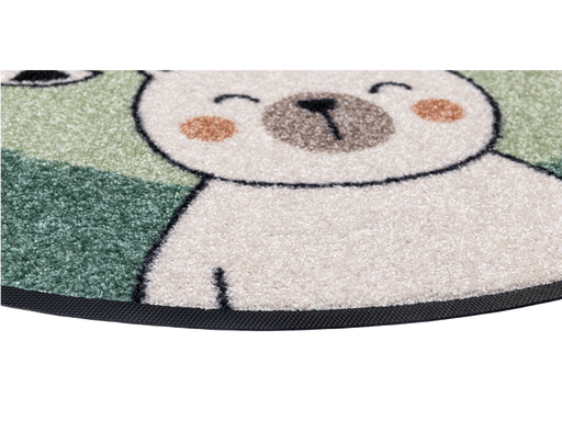 Eckdetail der runden Fußmatte mit Tieren auf mintgrünem Hintergund