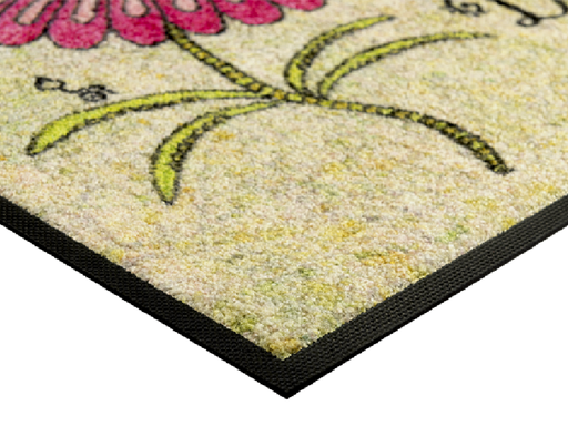 Eckansicht der Fußmatte mit Blume und Biene und Schriftzug "don´t worry, be happy"