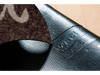 Rückenansicht der braunen Fußmatte mit Schriftzug "Benvenuti"