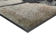 Eckansicht der Fußmatte mit Frau und Stern