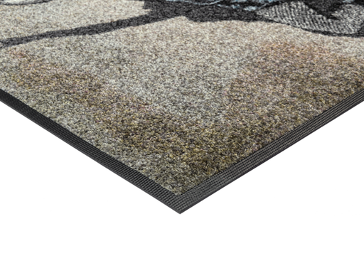 Eckansicht der Fußmatte mit Frau und Stern