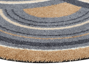 Eckansicht der Fußmatte in Sonderform mit naturfarbenen Kreisen