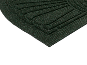 Eckansicht der Fußmatte für den Außenbereich in dunkelgrün mit 3D-Struktur