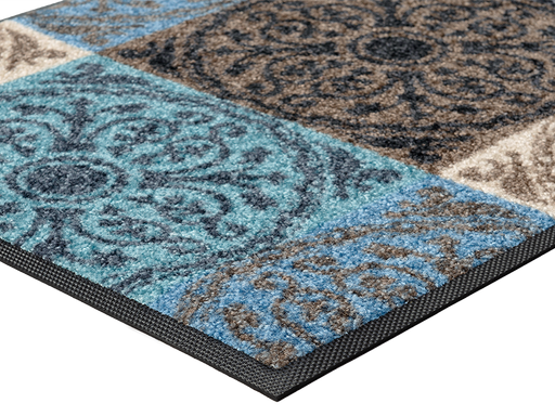 Eckansicht der Fußmatte mit runden Ornamenten und Blöcken