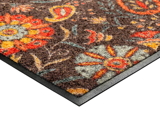 Eckansicht der Fußmatte mit orangen floralen Ornamenten