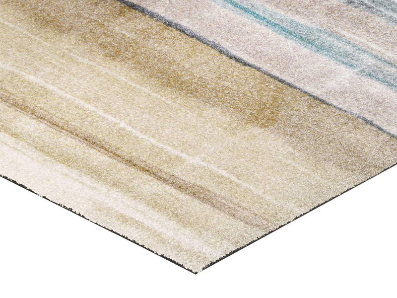 Eckansicht der Fußmatte mit beige-blauen Streifenmuster