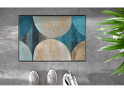 Fußmatte mit kreisförmigem Muster in Beige und Blau auf dem Fußboden