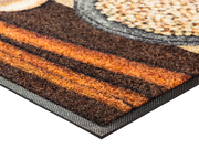 Eckansicht der Fußmatte mit verschiendenen Gewürzen in Brauntönen