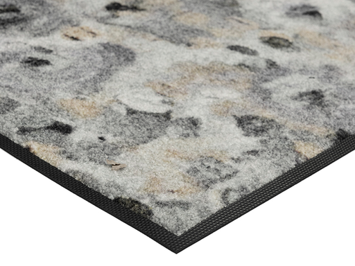 Eckansicht der FuĂmatte mit dezenten grau-gelben BlĂŒten