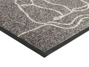 Eckansicht der Fußmatte mit Katzenformen in grau