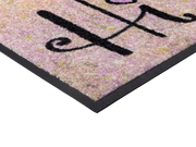 Eckansicht der Fußmatte mit Elefant und Blumenstrauß und Schriftzug „Hi“