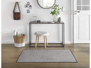 hellgraue Fußmatte im Eingangsbereich