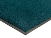 Eckansicht der einfarbigen Fußmatte in dunkel blau-grün
