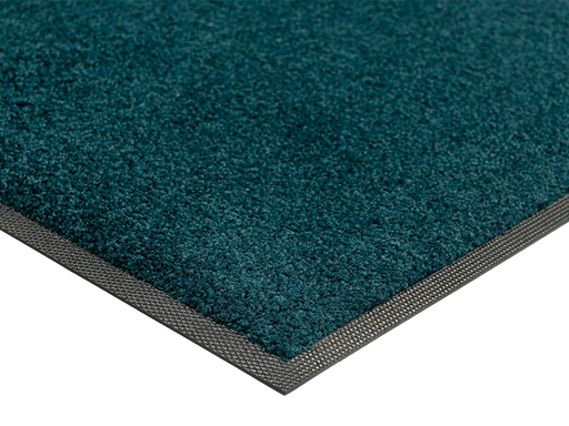Eckansicht der einfarbigen Fußmatte in dunkel blau-grün