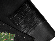 Rückenansicht der Fußmatte mit Auto und Weihnachtsbaum