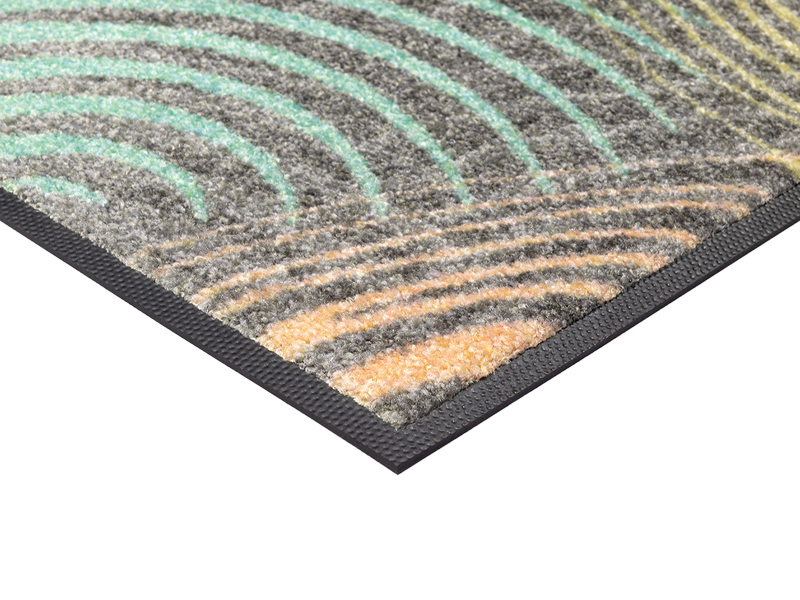 Eckansicht der Fußmatte mit bunten Kreisformen