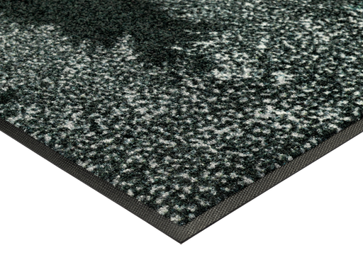 Eckansicht der Fußmatte mit grün-weißen Bäumen