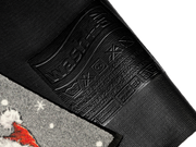 Rückenansicht der Fußmatte mit Eisbär und Pinguinen