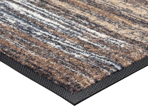 Eckansicht der Fußmatte mit Muster in Brauntönen