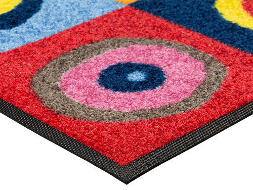 Eckansicht der Fußmatte mit runden Kreisen in bunten Farben