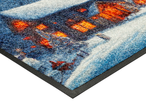 Eckansicht der Fußmatte mit winterlicher Landschaft und Häusern