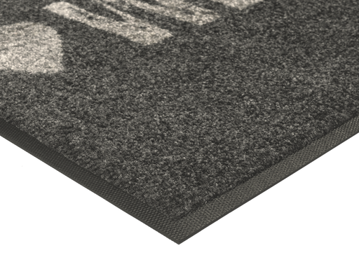 Eckansicht der Fußmatte mit Herz und Schriftzug "WELCOME"