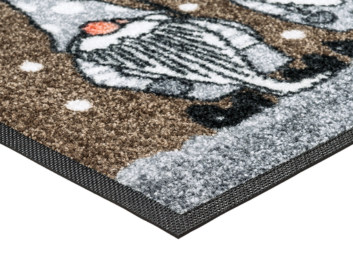 Eckansicht der Fußmatte mit drei grauen Zwergen mit Zipfelmütze