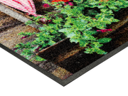 Eckansicht der Fumatte mit Almhütte und Spruch "Griaß Di"