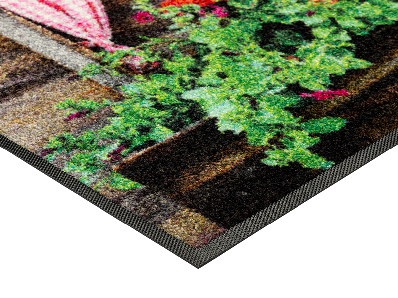 Eckansicht der Fumatte mit Almhütte und Spruch "Griaß Di"