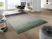 Fußmatte mit grün-schwarzer und dezenter Musterung im Wohnbereich