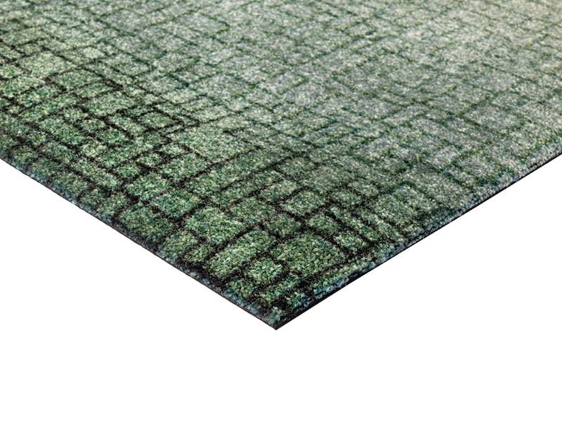 Eckansicht der Fußmatte mit grün-schwarzer und dezenter Musterung