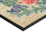 Eckansicht der Fußmatte mit bunten Blumendetails