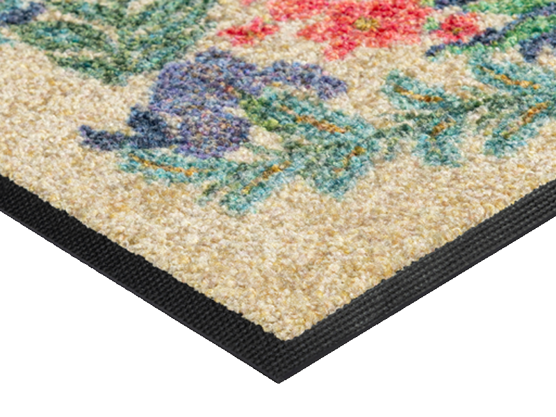 Eckansicht der Fußmatte mit bunten Blumendetails
