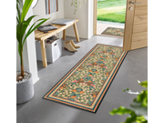 Fußmatte mit buntem floralem Muster im Eingangsbereich