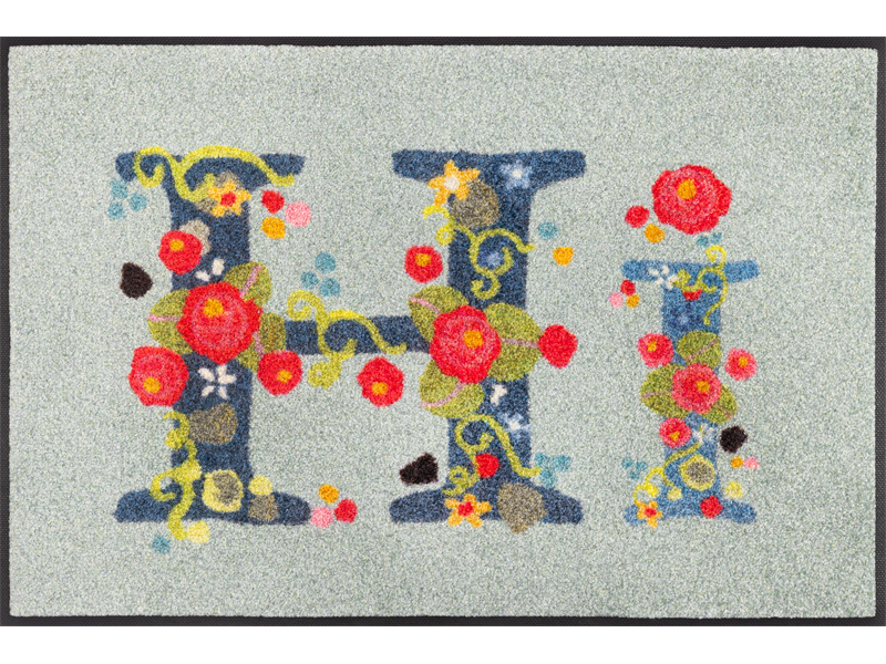 Fußmatte mit Schriftzug "HI" mit Blumen geschmückt