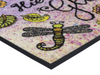 Eckansicht der Fußmatte mit Schriftzug "Hier wohnt das Glück" und gemalten Blumen-Tiermotiven