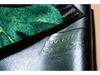Rückenansicht der Fußmatte mit grünen Blattmotiven