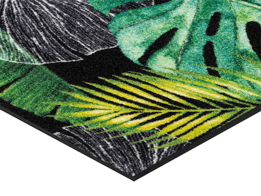Eckansicht der Fußmatte mit grünen Blattmotiven