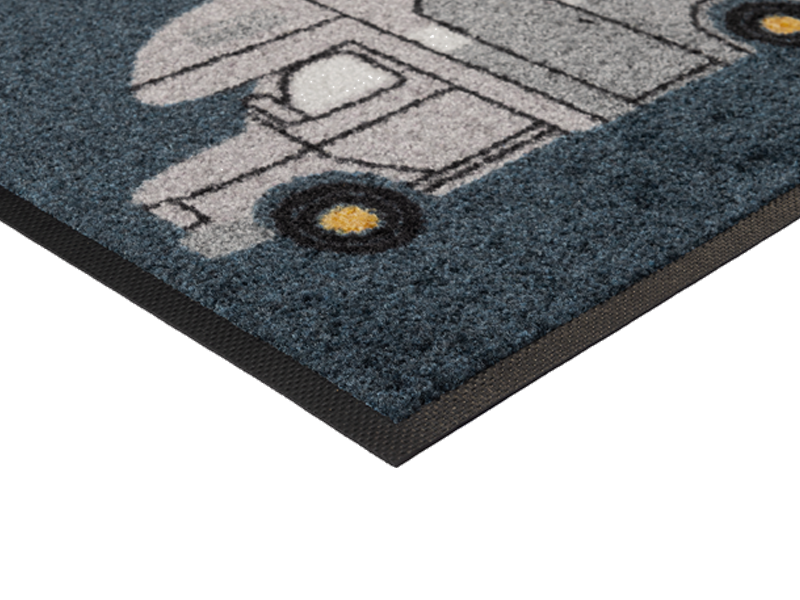 Eckansicht der Fußmatte mit Wohnwagen