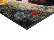 Eckansicht der Fußmatte mit Papagei und bunten Farben