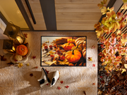Fußmatte mit herbstlichem Kürbismotiv vor der Tür