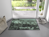 Fußmatte in grün/schwarz mit Bild einer Residence und Garten vor der Tür