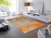 Fußmatte mit rustikaler grau-oranger Musterung im Wohnzimmer