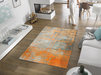Fußmatte mit rustikaler grau-oranger Musterung im Wohnzimmer