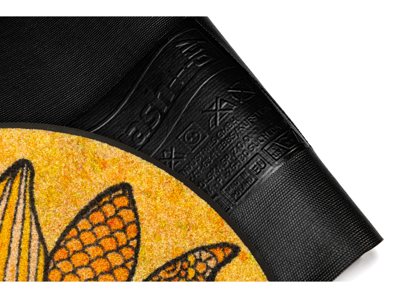 Rückenansicht der runden Fußmatte mit gelbem Sonnenblumenmotiv