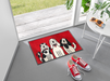 rote Fußmatte mit drei Hunden im Eingangsbereich