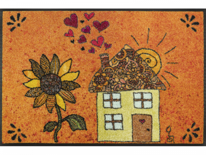 Fußmatte mit gezeichnetem Haus und einer großen Sonnenblume